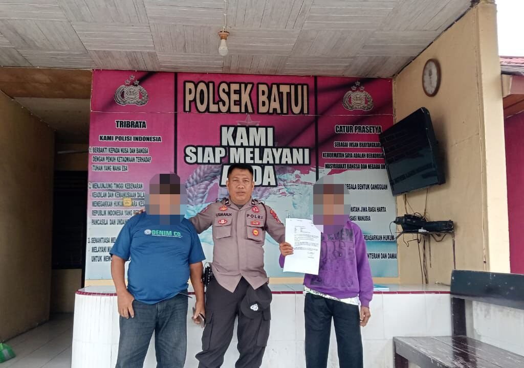 Personil Polsek Batui - Aipda Usman, bersama Pihak yang bersengketa
